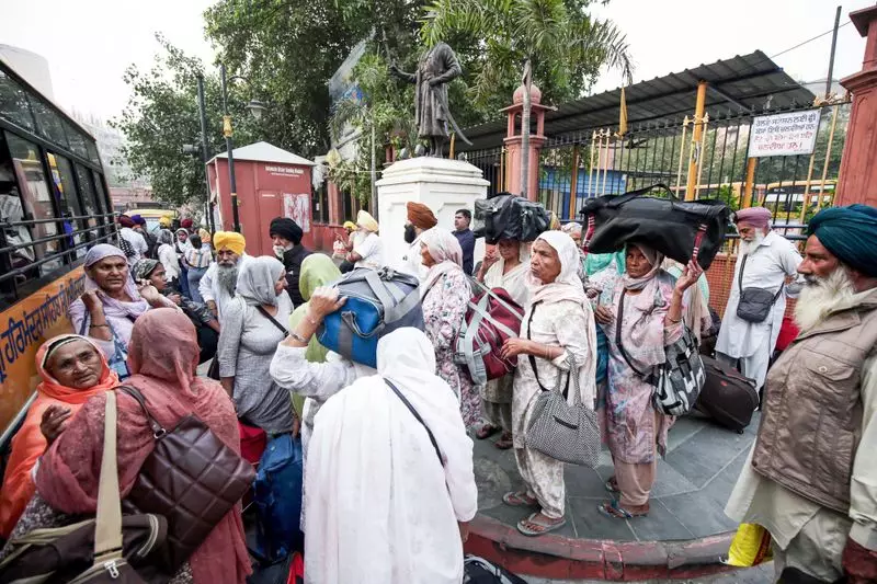 Indian Pilgrims Celebrate Guru Nanak's 556th Birth Anniversary at Pakistan's Nankana Sahib | Historic Cross-Border Pilgrimage