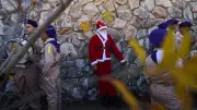 Israeli Police Arrest Palestinian Santa Claus at Christmas Party in Bethlehem