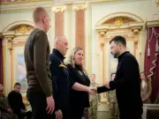 Zelenskyy Awards Hero of Ukraine Titles, Presents Housing to Security Forces