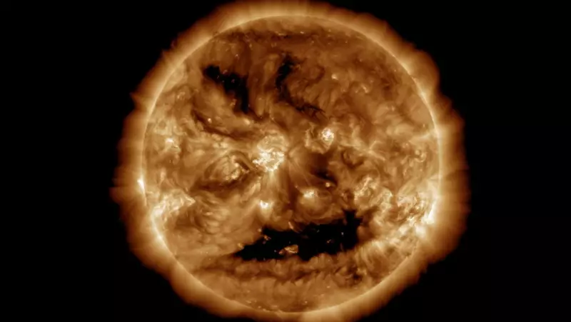 NASA Captures Spooky 'Jack-O-Lantern' Face Glowing on the Sun - Solar Phenomenon Explained