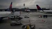 Delta Flight Attendant's ₹5.8 Lakh Mistake: Emergency Slide Deployed Mid-Flight, Stranding 170 Passengers
