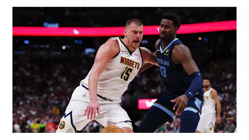 Jokic's Wrist Injury Casts Doubt on Nuggets vs Suns Clash