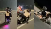 Shocking Video: Daredevil Bikers' Helmet-Free Stunt Ends in Terrifying Crash - WATCH