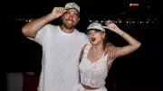 Travis Kelce's 'Showgirl' Sweatshirt: A Subtle Nod to Taylor Swift