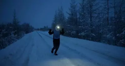 Global Photo Highlights: Venezuela's Oil Hand, Kyiv's Frozen Streets, Taj Mahal Tribute