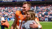 Bo Nix's Playoff Victory Marred by Season-Ending Injury, Wife Captures Emotional Aftermath
