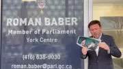 Canadian MP Lights Cigar from Burning Photo of Iran's Supreme Leader in Viral Protest Trend