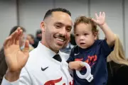 Carlos Correa's Heartwarming Off-Field Moment with Child Captivates Baseball Fans
