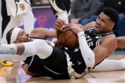 Giannis Antetokounmpo Ruled Out for Bucks vs 76ers Clash Due to Calf Strain