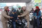 Ludhiana Police Distributes Iron Shields to Protect Riders from Banned Kite Strings