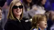Rosamund Pike Attends NBA London Game with Son Atom in Rare Public Outing