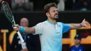 Stan Wawrinka Celebrates Historic Five-Set Win at Australian Open with a Beer