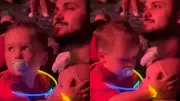 Toddler's Viral Act: Big Brother Shields Baby Sister from Fireworks Noise