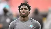 Dolphins Face Tough Decision on Tyreek Hill's Future Amid Injury and Cap Concerns