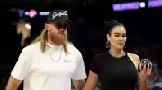George Kittle's 'Woof' Reaction to Wife Claire's SI Swimsuit Cover Goes Viral
