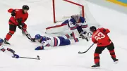 Hellebuyck's Heroic First Period Anchors USA's Gold Medal Game Lead Over Canada