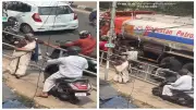 Kerala Elderly Woman's Viral Act: Halting Scooter on Footpath Wins Praise