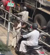 Kerala MVD Honors Elderly Woman Who Blocked Scooter on Footpath