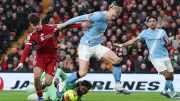 Manchester City Edges Liverpool 2-1 in Thriller to Chase Arsenal