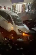Parked Car Plunges into Open Drain in Noida, Sparks Civic Safety Outcry