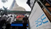 Sensex Surges 266 Points as RBI Holds Rates; ITC, Banks Lead Rally