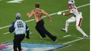 Super Bowl LX Halted by Shirtless Field Intruder in Planned Marketing Stunt