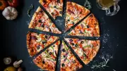 The Pizza Theorem: How Uneven Slices Can Still Be Fairly Divided