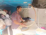 Bengaluru's Ironing Stalls Hit by LPG Shortage Amid Global Geopolitical Crisis