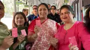 Delhi CM Rekha Gupta Inspects Saheli Pink Smart Card on DTC Bus Ride
