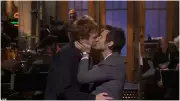 Harry Styles Mocks Queerbaiting Accusations with Surprise SNL Kiss