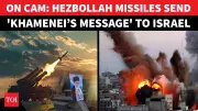 Hezbollah Launches Rockets Featuring Khamenei's Image in Major Escalation Against Israel