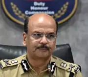 Telangana DGP Distributes Land Patts to Families of 2008 Balimela Ambush Martyrs