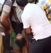 Woman Faints in LPG Queue Amid Heatwave; Viral Video Sparks Administration Action