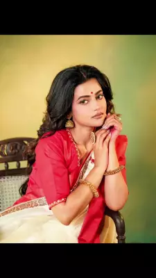 Ushasi Ray Embraces Classic Elegance in Red-Border White Sari for Bengali New Year