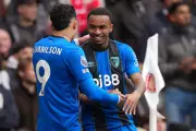 Arsenal's Title Hopes Dented by Bournemouth Defeat, Boosting Manchester City
