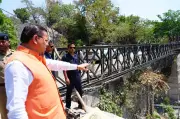 CM Dhami Inspects Mussoorie Road Bridge, Directs Swift Completion for Public Ease