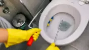 Fix a Clogged Toilet Without a Plunger Using Household Items