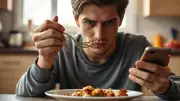 How Distracted Eating Sabotages Digestion and Weight Management