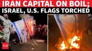 Iranian Protesters Burn US, Israel Flags in Tehran, Reject Ceasefire as 'War Not Over'