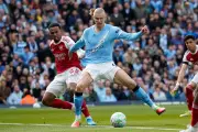 Manchester City Seizes Premier League Lead with 2-1 Victory Over Arsenal