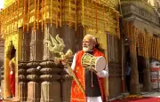Modi holds trishul and damru at Kashi Vishwanath Temple before Bengal polls