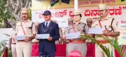 Retired Police Officer Emphasizes Harmony as Core Police Duty at Mandya Flag Day