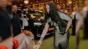 Rihanna Feeds Cow with Calfskin Dior Bag Sparks Online Backlash