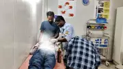 Security Guard Assists Doctors in Bihar Hospital Amid Staff Shortage Crisis