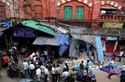 BJP Rally in Kolkata Uses Payloader to Demolish TMC Hawker Union Office