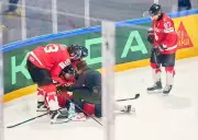 Canada's Evan Bouchard Injured by Ryan Lindgren's Hit in World Championship Quarterfinal