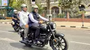 Congress Slams Fadnavis for Riding Bike with Expired PUC Certificate