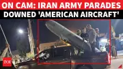 Iran Parades Suspected US Drone Wreckage After Shooting It Down Near Hormuz Strait