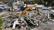 Israeli Bulldozers Demolish Palestinian Shops for Settlement Road Project