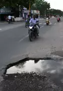 Large Potholes on Iravathanallur Main Road in Madurai Disrupt Traffic, Cause Accidents